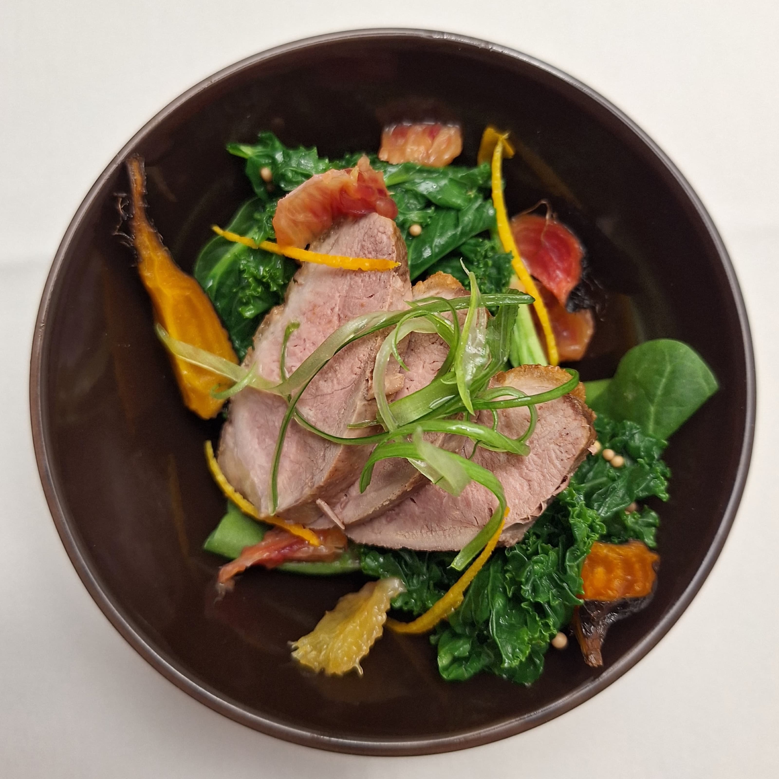 Duck Salad — greens · sesame