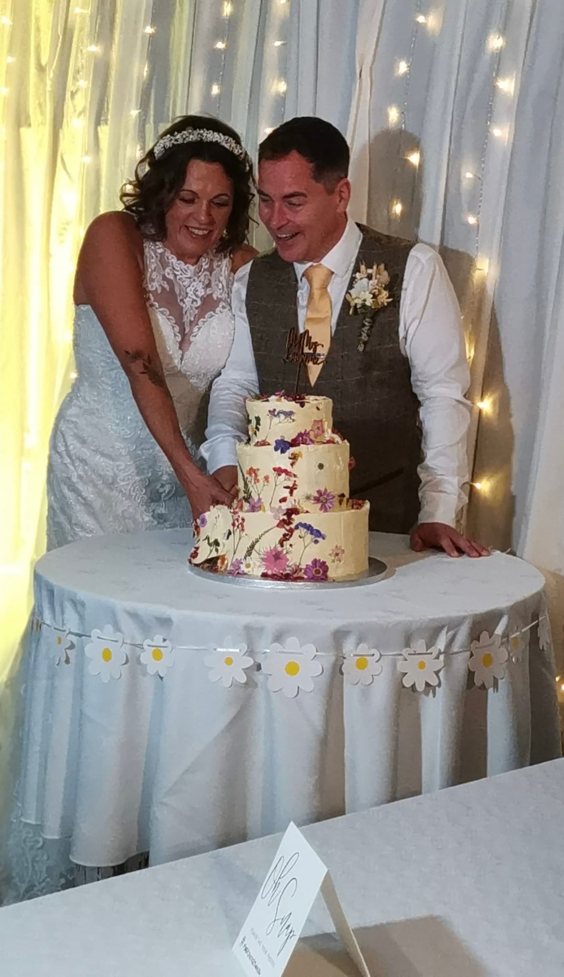 The Cutting — wedding · daisies