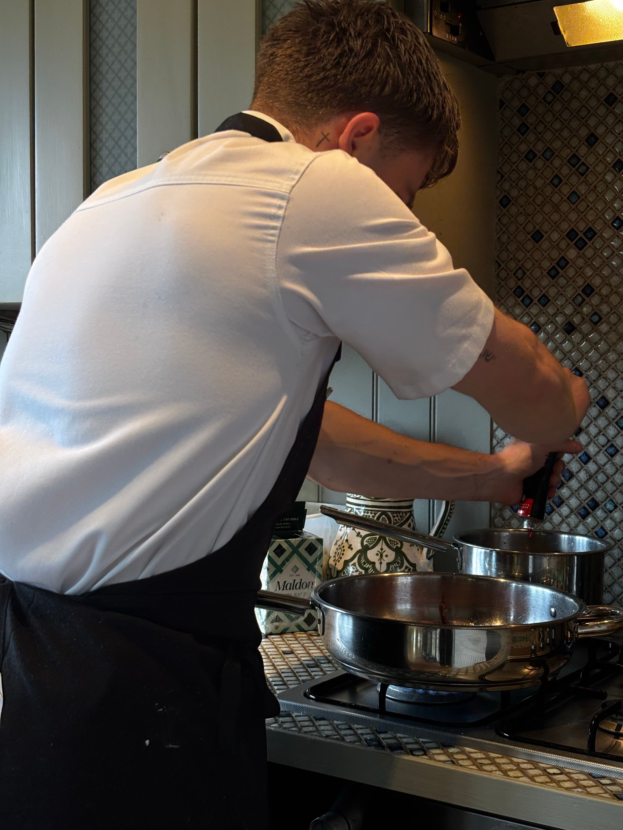 At the Stove — steel · steam