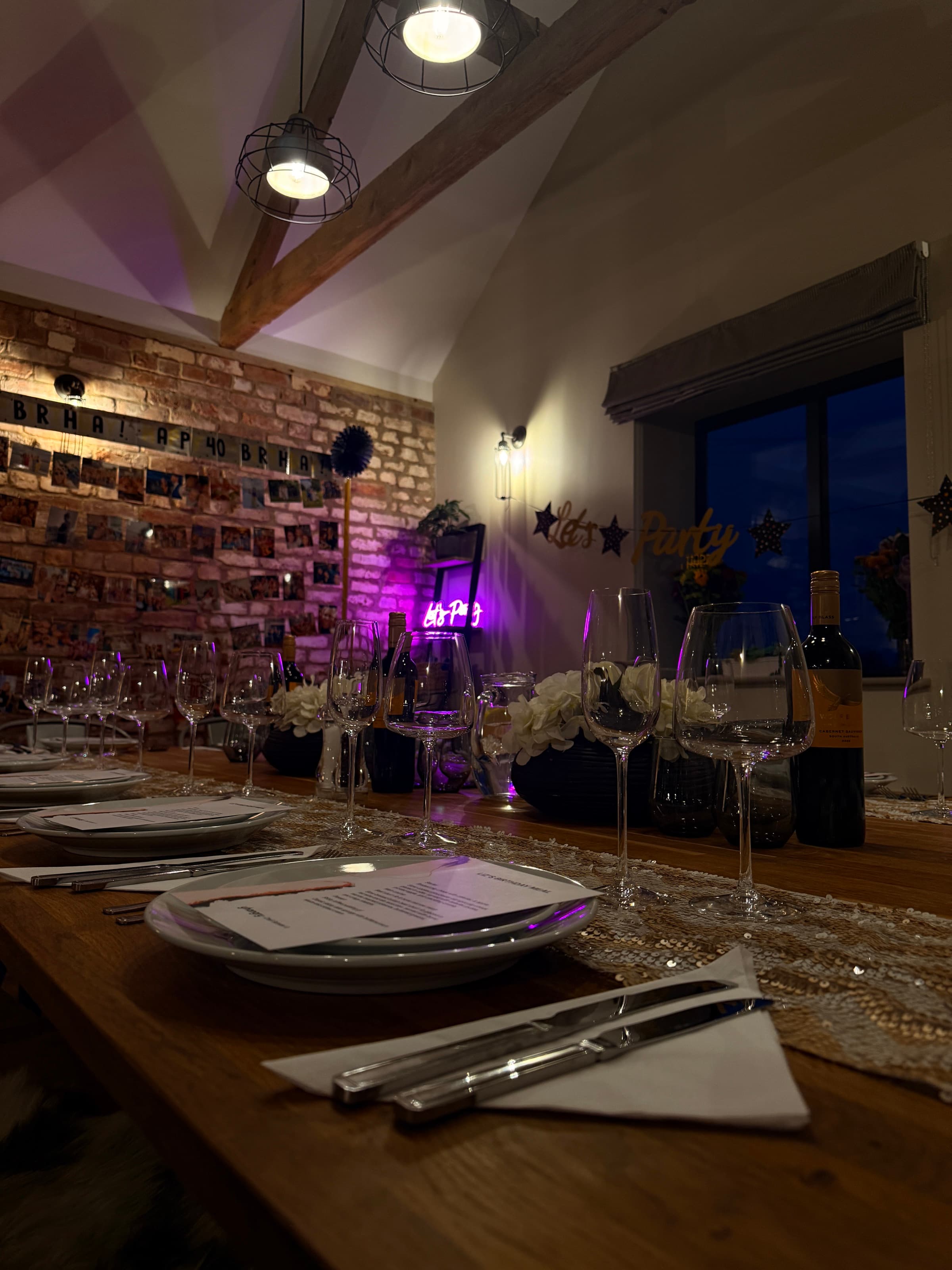 The Barn, December — brick · candlelight