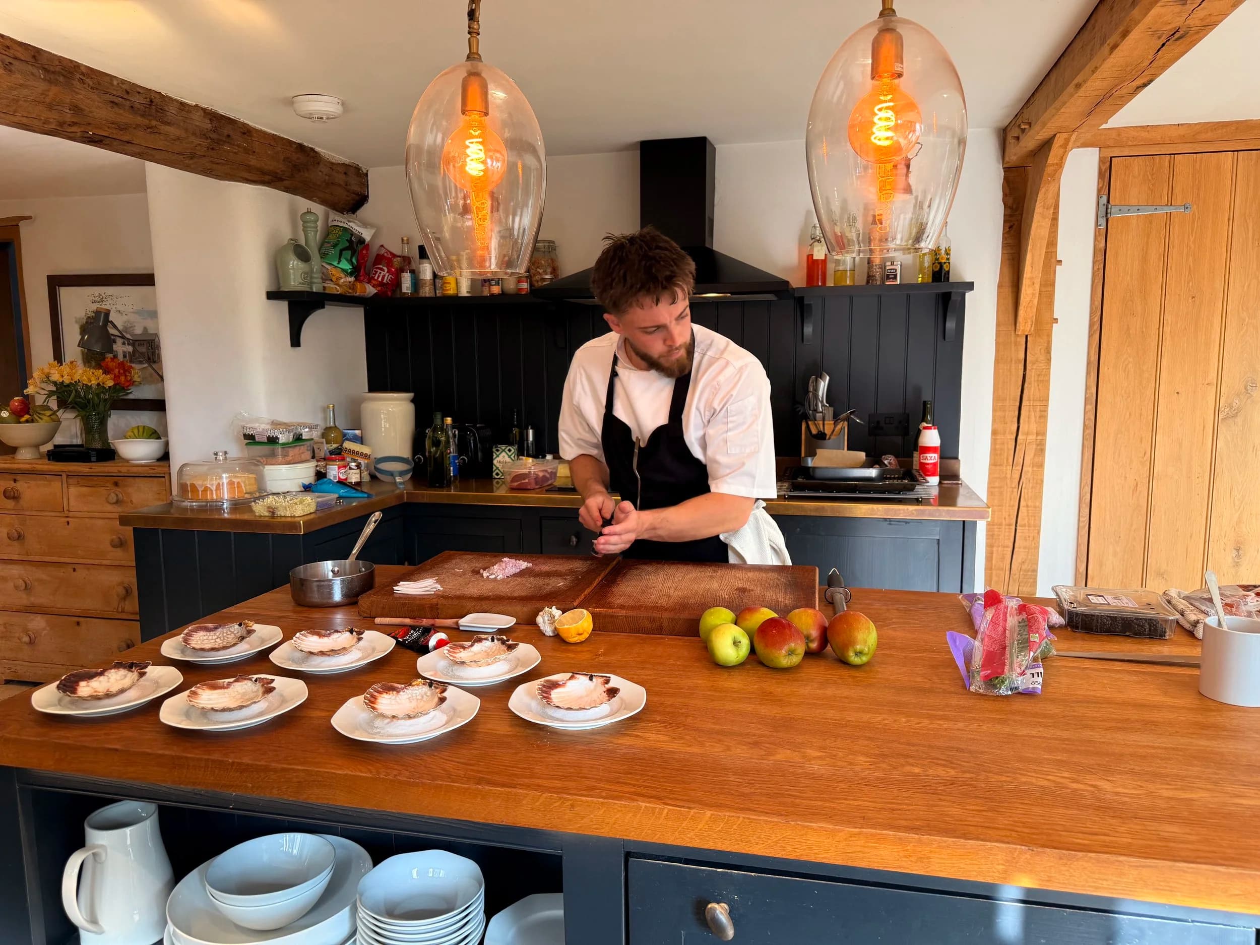 Samuel plating fish courses during service