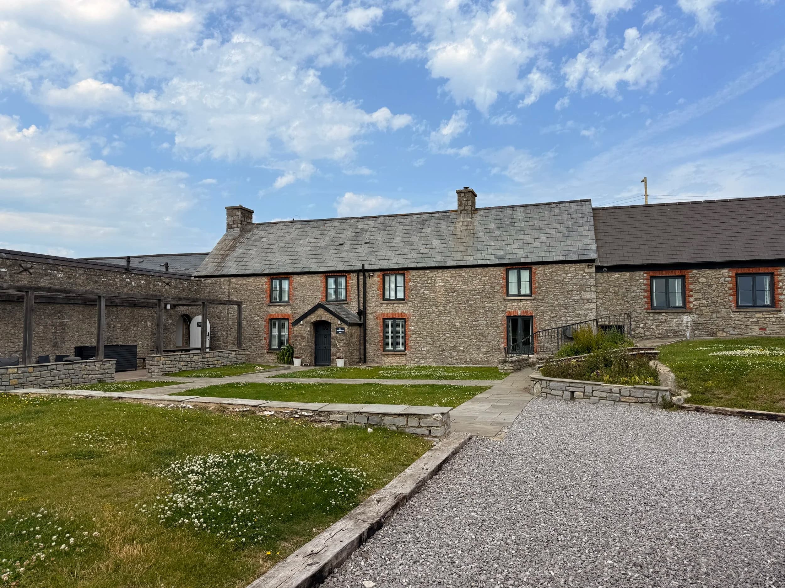 A stone country house in soft light